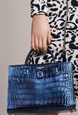 Сумка от Christian Dior с живтным принтом синяя