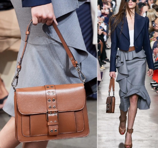 кожаная коричневая деловая женская сумка-конверт с дополнительным боковым карманом от бренда  Michael Kors - модель идет в комплекте с серой юбкой-годе, декорированной воланом