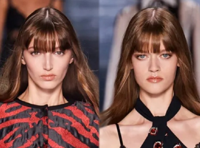 тренды длинных женских волос весна-лето 2022 - пряди цвета темной карамели с серединным пробором и челкой-шторкой ниже бровей. Подиум Dolce & Gabbana, фото моделей.