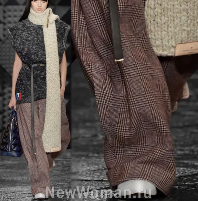 коричнеавые шерстяные клетчатые женские брюки 2024 года с серым жилетом и длинным бежевым шарфом - тренды от бренда Louis Vuitton, FALL 2023 READY-TO-WEAR, Франция