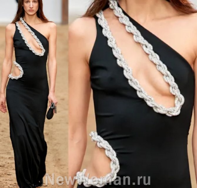 роскошное длинное черное вечернее облегающее фигуру платье с вырезами, декорированными плетеными цепочками из серебряного материала с люрексом.