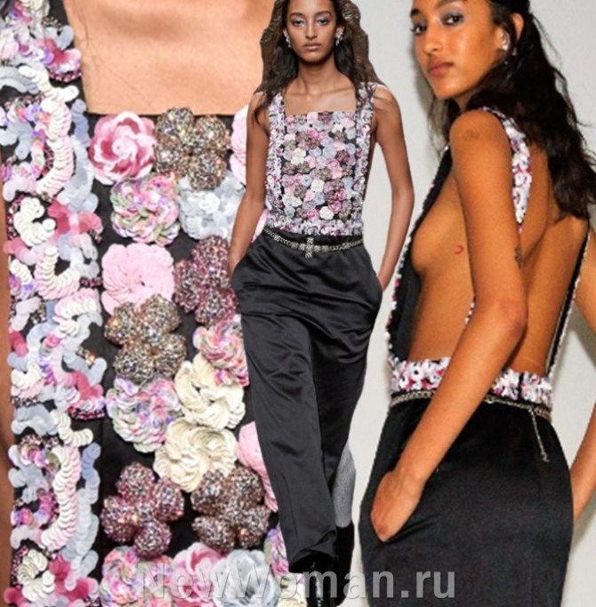 модный вечерний яркий топ 2024 года от модного дома Шанель - с цветочными аппликациями и вырезами на спине и по бокам.