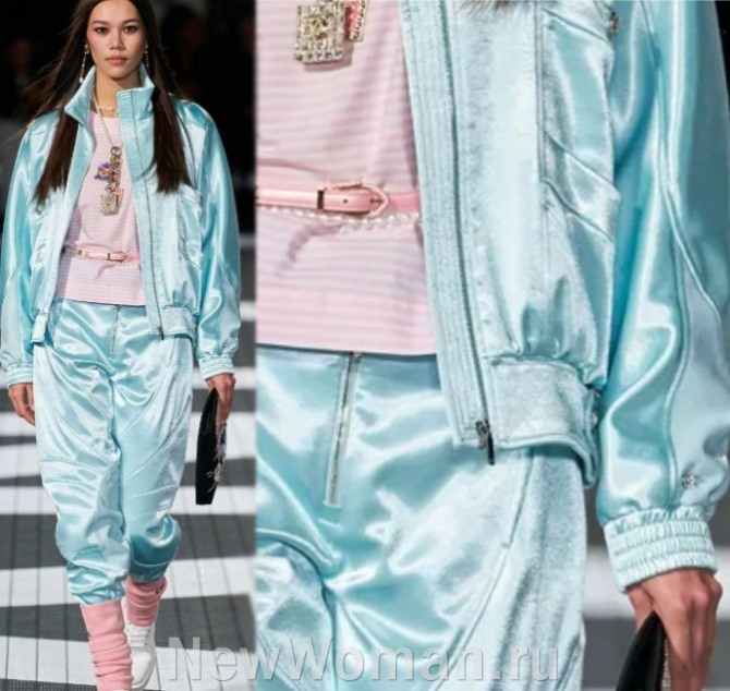женский модный уличный образ 2024 года в стиле спорт-шик из атласной ткани бирюзового цвета